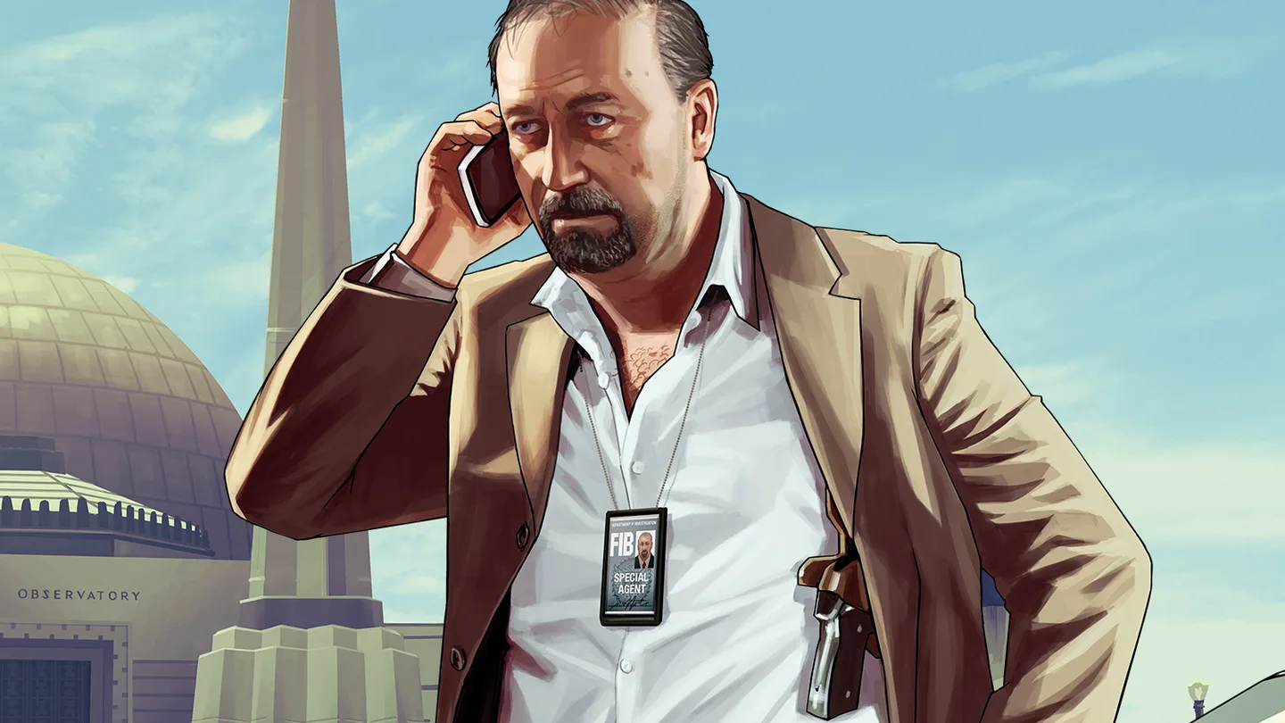 Dave Norton on the phone with a badge, in front of the observatory