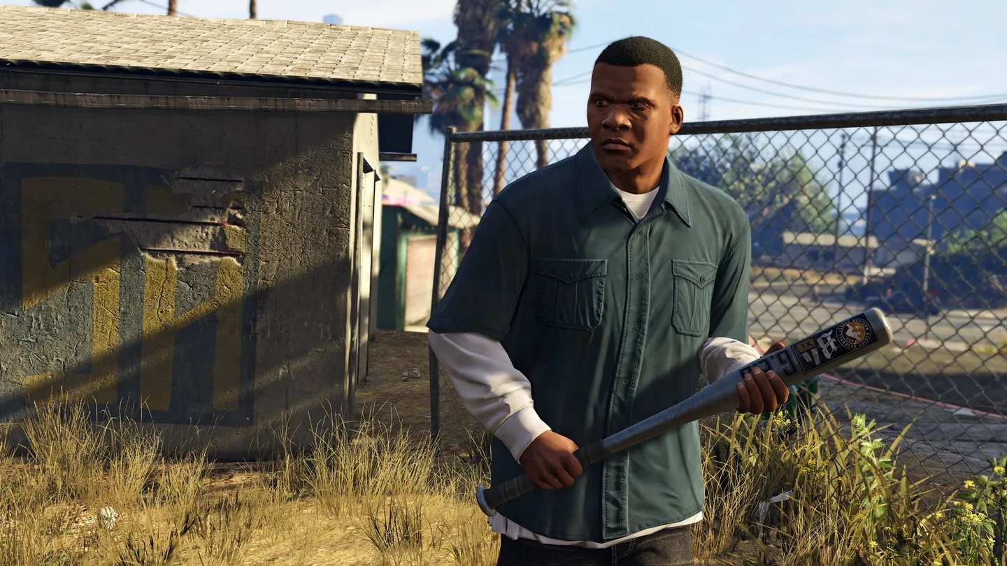 Franklin Clinton holding a baseball bat
