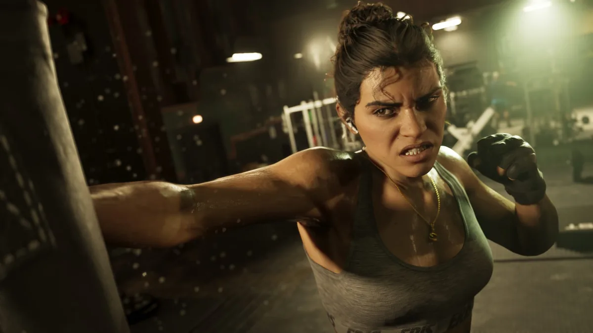 Lucia Caminos punching a heavy bag in a boxing gym, official GTA 6 screenshot