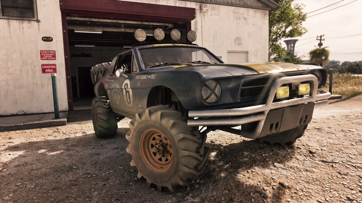 The '67 Vapid Dominator Buggy pulling out of the Paradise Garage in Watson Bay, official GTA 6 screenshot