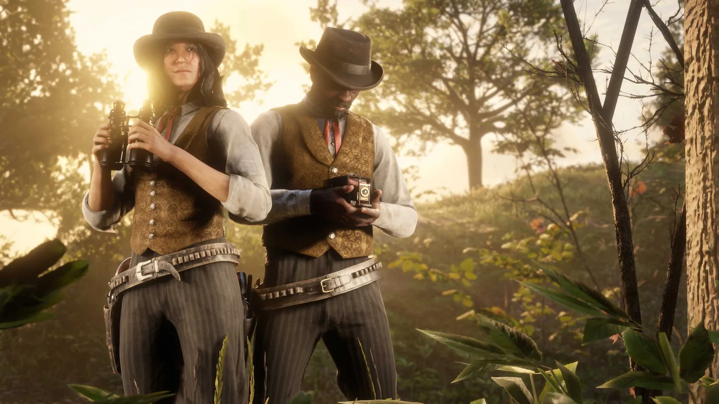 Two players in waistcoats in a sunny forest, one with binoculars and one with a camera