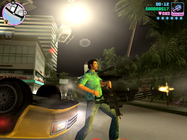 Tommy Vercetti firing a minigun at night